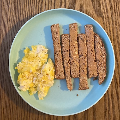 Toddler breakfast eggs and toast.