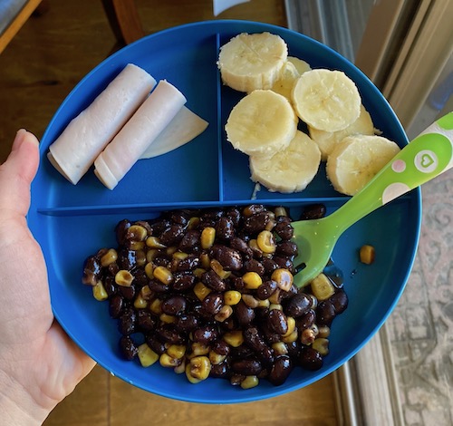 Toddler lunch idea black beans and corn.