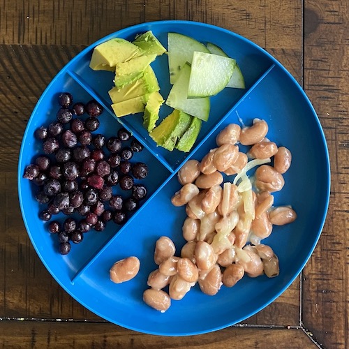 Toddler lunch idea with pinto beans and cheese