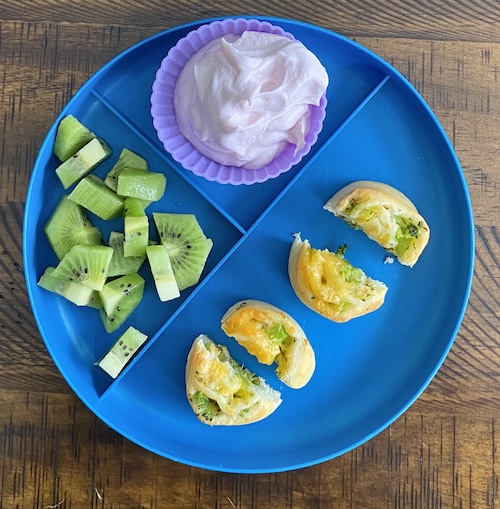 Broccoli & cheese pinwheels: toddler meal idea with yogurt and kiwi