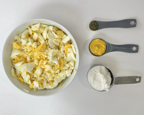 Egg salad ingredients; eggs, greek yogurt, mustard, dill