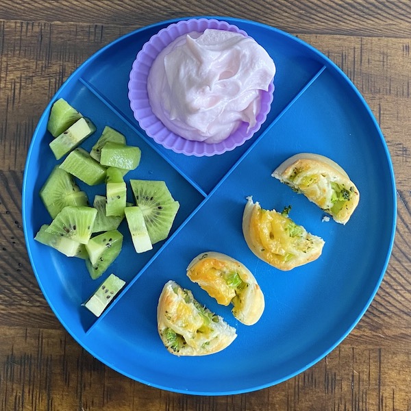 Broccoli and cheese pinwheels toddler lunch plate